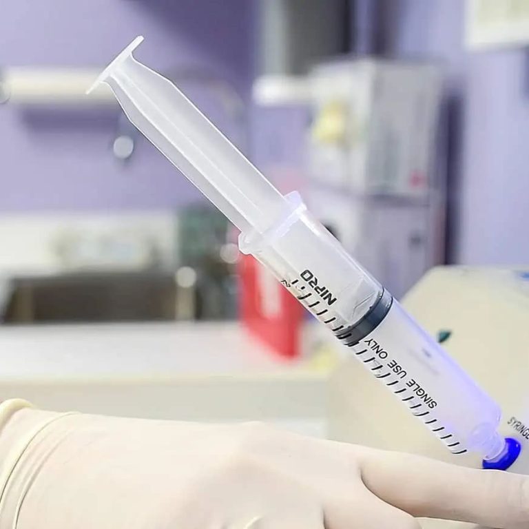 Filling Syringe With Ozone In Preperation For Injection